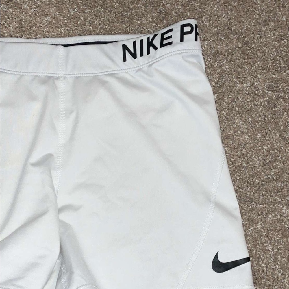 white nike pros